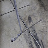 After drilling, holes are filled with High Strength Epoxy Paste. Then, Crack Lock is inserted into the