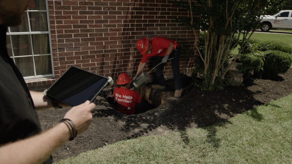 foundation repair crew onsite 