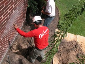 olshan crew member leveling house in baton rouge, LA